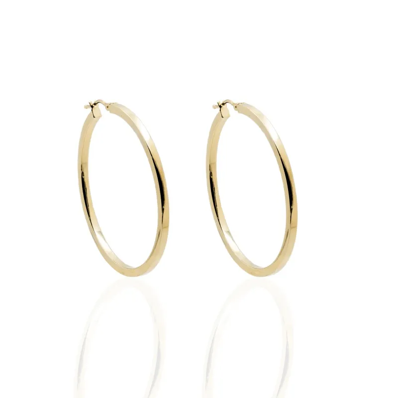 Orecchini in Oro 750 a Cerchio Canna Quadra