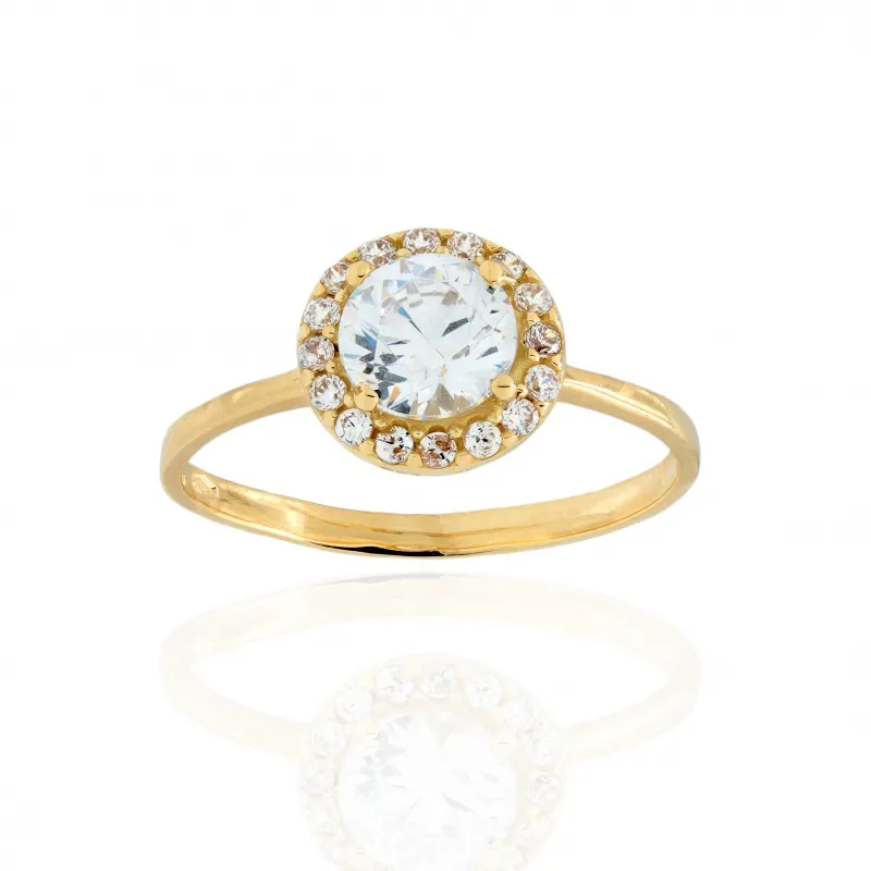 Anello in Oro 750 con Centrale e Contorno di Zirconi