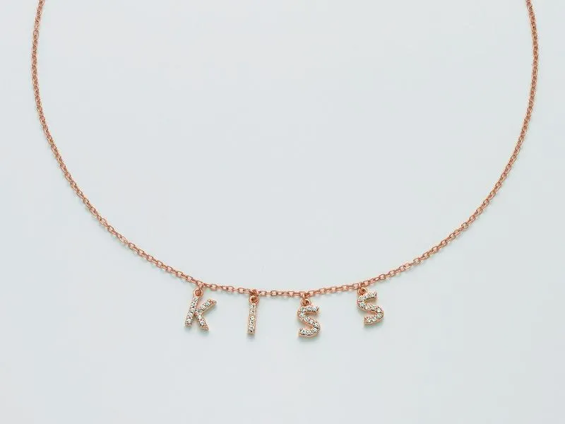 Collana donna Kiara con scritta kiss in ottone rosè e zirconi KCLD3883R